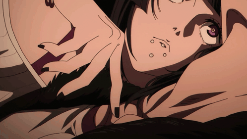 A Close Up Of A Person 'S Face With A Purple Eye And The Number 3 On It GIF