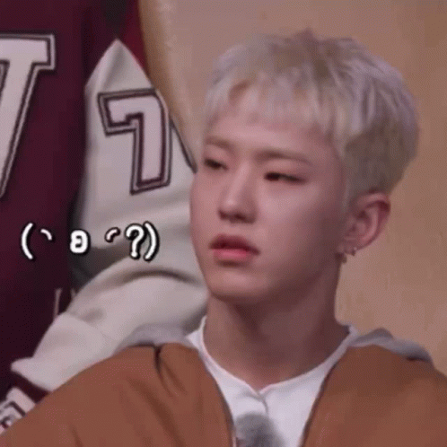 A Close Up Of A Person 'S Face With A Question Mark On It . GIF