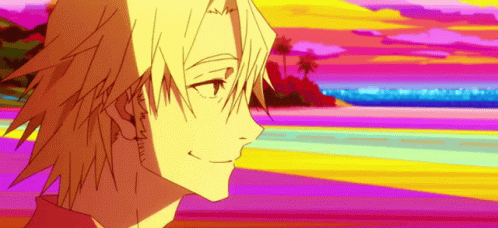 A Close Up Of A Person 'S Face With A Rainbow Background . GIF