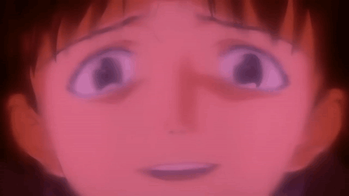 A Close Up Of A Person 'S Face With A Red Background And A Purple Eye . GIF