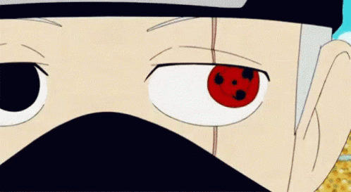 A Close Up Of A Person 'S Face With A Red Eye And A Black Mask . GIF
