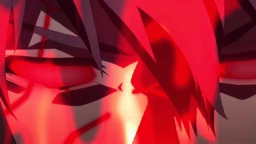 A Close Up Of A Person 'S Face With A Red Light Coming Out Of It GIF