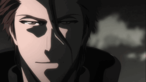 A Close Up Of A Person 'S Face With A Shadow On It GIF