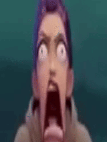 A Close Up Of A Person 'S Face With A Shocked Look On Their Face . GIF