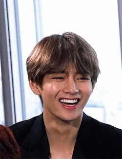 A Close Up Of A Person 'S Face With A Smile On It GIF