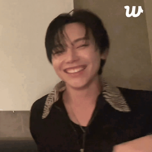 A Close Up Of A Person 'S Face With A Smile On It . GIF