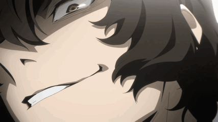 A Close Up Of A Person 'S Face With A Smirk On Their Face GIF