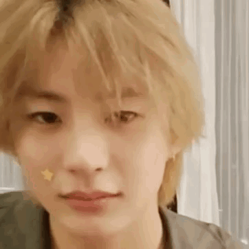 Close Up Of Person's Face With Star GIF