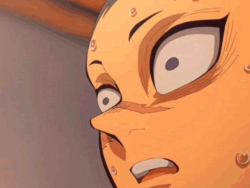 A Close Up Of A Person 'S Face With A Surprised Expression GIF
