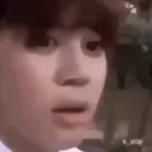A Close Up Of A Person 'S Face With A Surprised Look On His Face . GIF