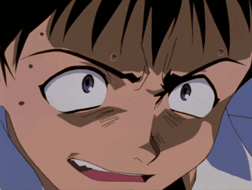 A Close Up Of A Person 'S Face With A Surprised Look On Their Face GIF