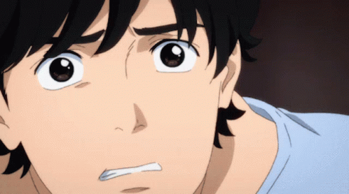 A Close Up Of A Person 'S Face With A Surprised Look On Their Face GIF