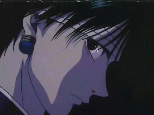 A Close Up Of A Person 'S Face With A Tear Coming Out Of Their Eye GIF