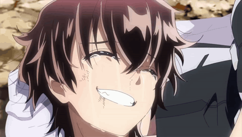 A Close Up Of A Person 'S Face With A Tear Running Down Their Face GIF