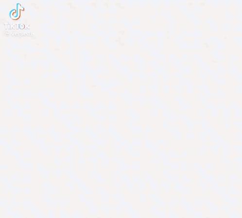 A Close Up Of A Person 'S Face With A Tiktok Logo In The Corner . GIF