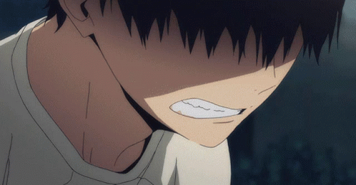 A Close Up Of A Person 'S Face With A Very Angry Expression GIF