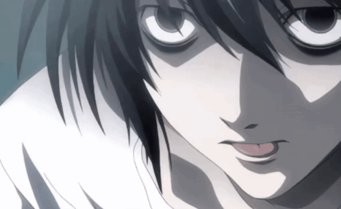 A Close Up Of A Person 'S Face With A White Shirt GIF