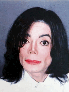 A Close Up Of A Person 'S Face With A White Shirt On GIF