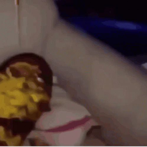 A Close Up Of A Person 'S Face With A Yellow Sauce On It GIF
