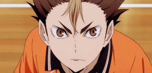 A Close Up Of A Person 'S Face With An Angry Look On It GIF