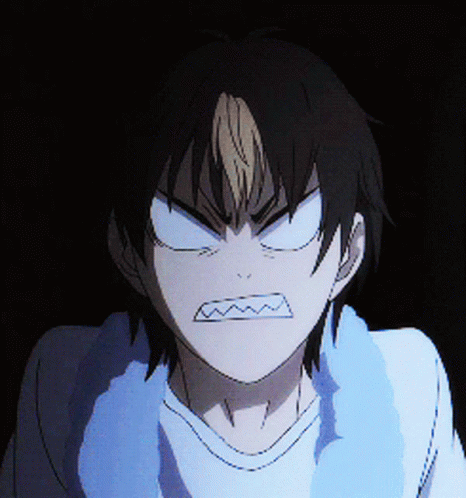 A Close Up Of A Person 'S Face With An Angry Look On Their Face GIF