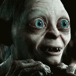 A Close Up Of A Person 'S Face With Big Blue Eyes GIF