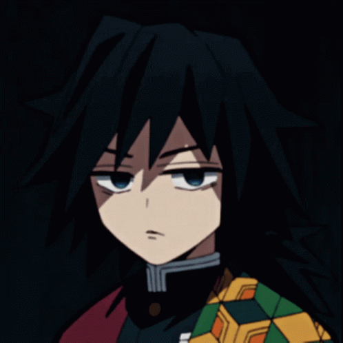 A Close Up Of A Person 'S Face With Black Hair GIF