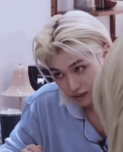 A Close Up Of A Person 'S Face With Blonde Hair GIF