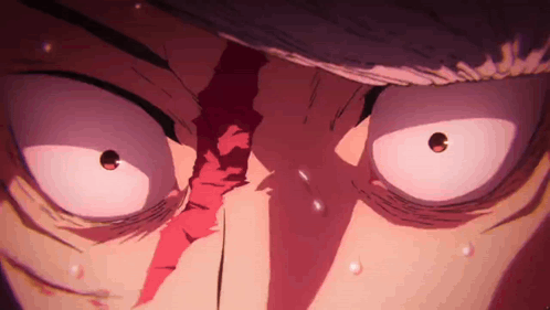A Close Up Of A Person 'S Face With Blood Coming Out Of His Eyes . GIF
