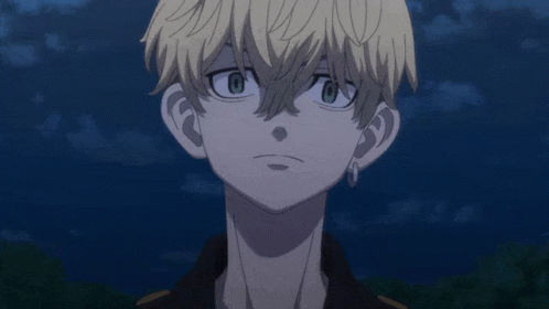 A Close Up Of A Person 'S Face With Blue Eyes GIF