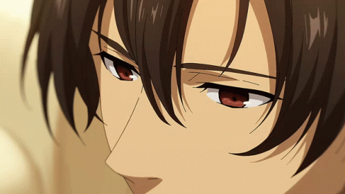 A Close Up Of A Person 'S Face With Brown Hair GIF