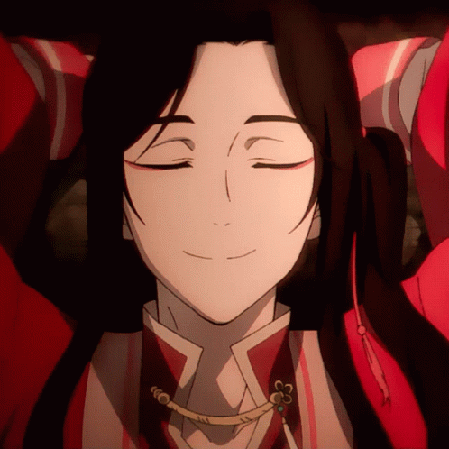 A Close Up Of A Person 'S Face With Closed Eyes GIF