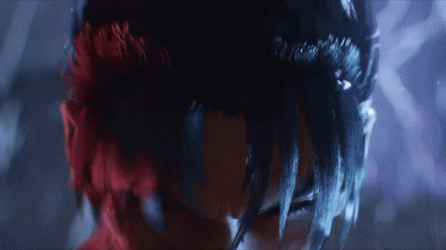 A Close Up Of A Person 'S Face With Dark Hair GIF