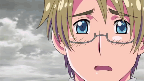 a close up of a person 's face with glasses and blue eyes