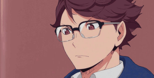 A Close Up Of A Person 'S Face With Glasses On GIF