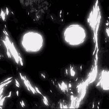 A Close Up Of A Person 'S Face With Glowing Eyes . GIF