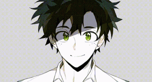 A Close Up Of A Person 'S Face With Green Eyes GIF