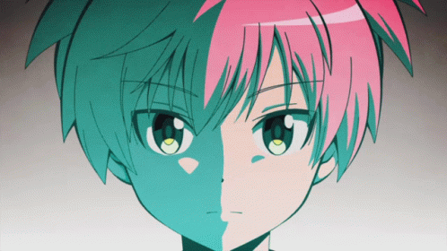 A Close Up Of A Person 'S Face With Half Blue And Half Pink GIF