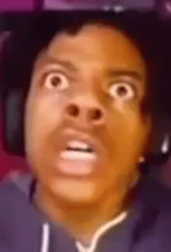 A Close Up Of A Person 'S Face With Headphones On . GIF