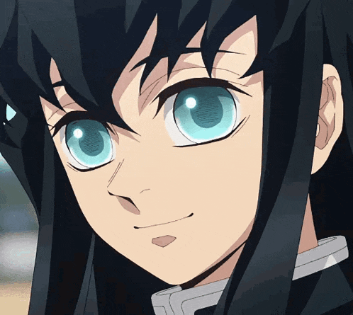 A Close Up Of A Person 'S Face With Long Black Hair And Blue Eyes GIF