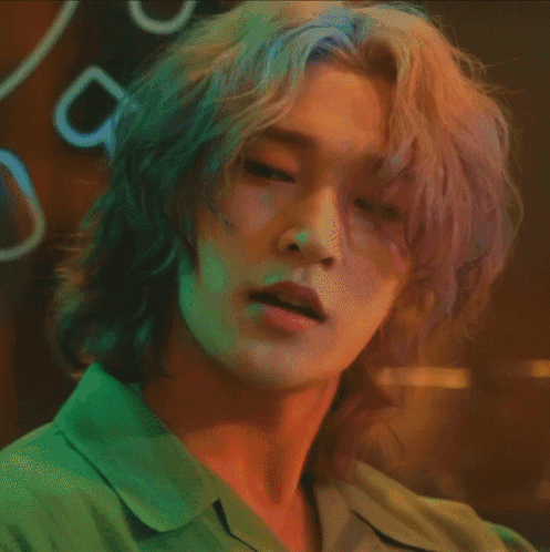 A Close Up Of A Person 'S Face With Long Hair GIF