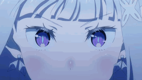 A Close Up Of A Person 'S Face With Purple Eyes GIF