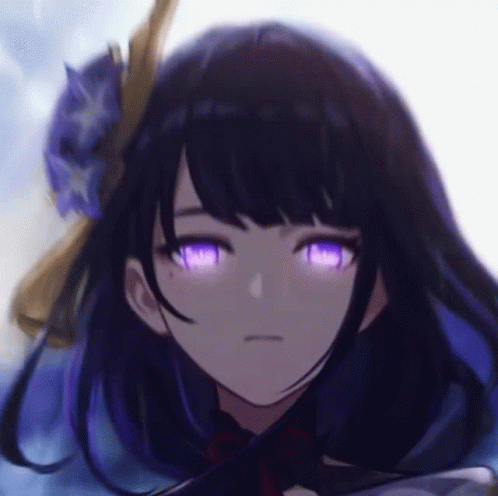 a close up of a person 's face with purple eyes and a flower in her hair .
