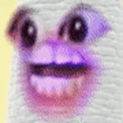 A Close Up Of A Person 'S Face With Purple Eyes And Purple Lips . GIF