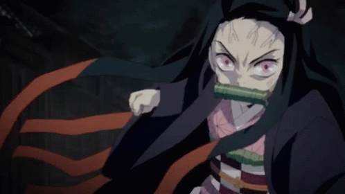 A Close Up Of A Person 'S Face With Red Eyes And A Green Nose GIF
