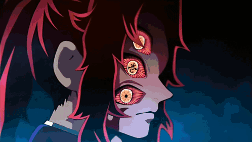 A Close Up Of A Person 'S Face With Red Eyes And Chinese Writing GIF