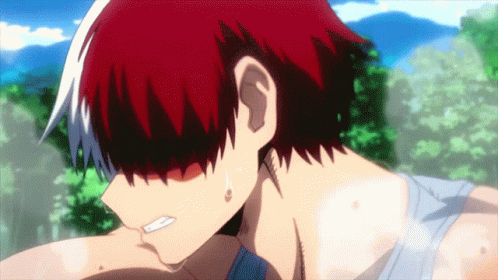 A Close Up Of A Person 'S Face With Red Hair GIF