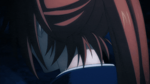 A Close Up Of A Person 'S Face With Red Hair And A Cross On It GIF