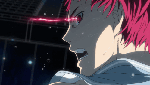 A Close Up Of A Person 'S Face With Red Hair And Glowing Eyes GIF