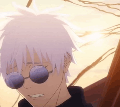 A Close Up Of A Person 'S Face With Sunglasses On GIF